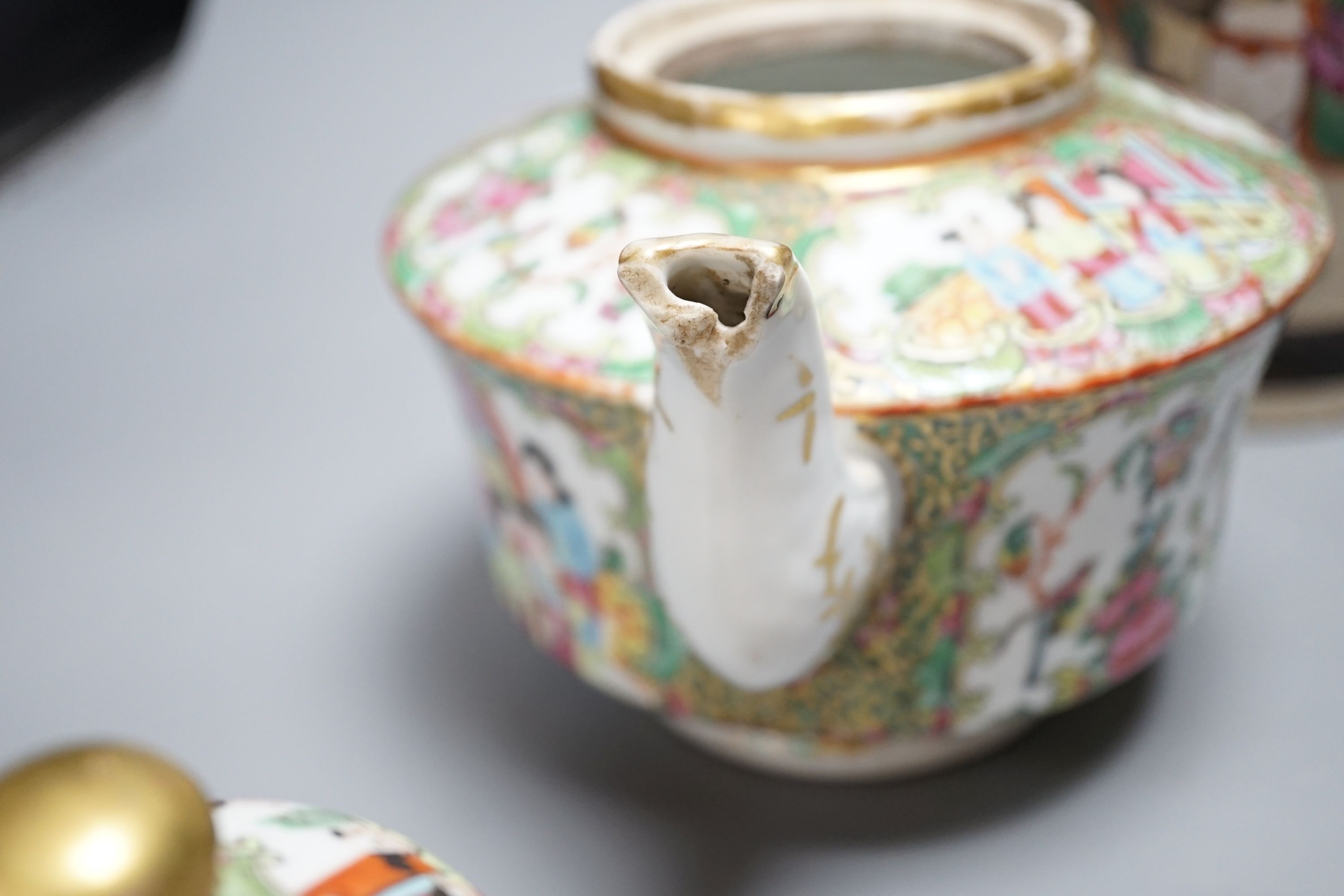 A Chinese famille rose crackleglaze vase, 29cm, together with a famille rose teapot and a crackleglaze celadon ground bottle vase